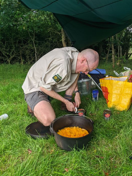 Christian opening a tin